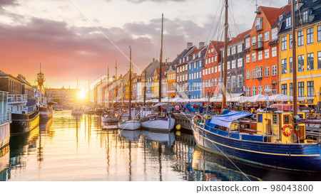Copenhagen city skyline in Denmark at famous old Nyhavn port 98043800
