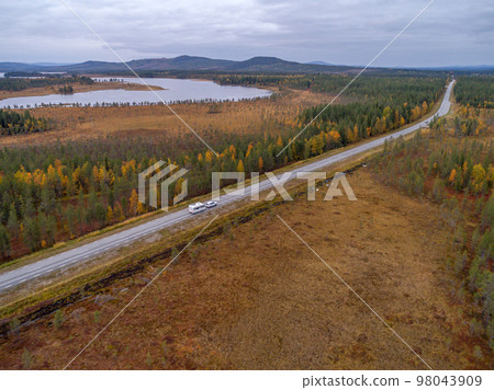 drone footgage Car Camping Caravan driving road lake Swedish Lapland fall ruska colors National Park Sweden drone footgage Car Camping Caravan driving road lake Swedish Lapland fall ruska colors National Park Sweden 98043909