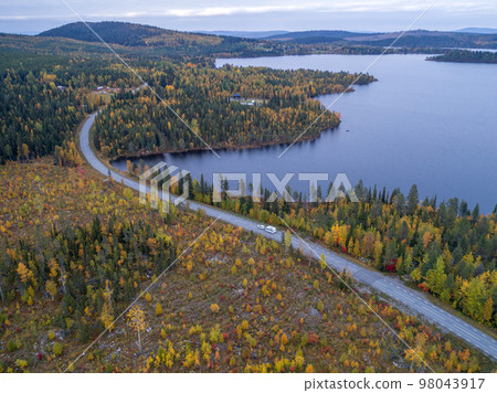 drone footgage Car Camping Caravan driving road lake Swedish Lapland fall ruska colors National Park Sweden drone footgage Car Camping Caravan driving road lake Swedish Lapland fall ruska colors National Park Sweden 98043917
