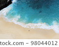 Sea and sandy beach seen from above 98044012