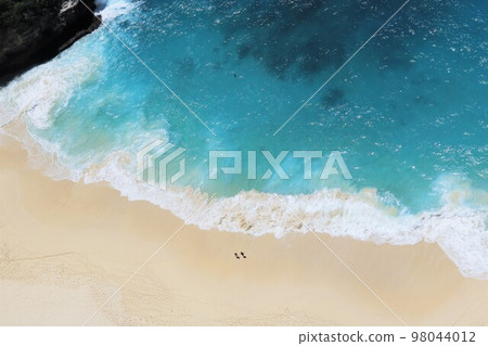 Sea and sandy beach seen from above Sea and sandy beach seen from above 98044012