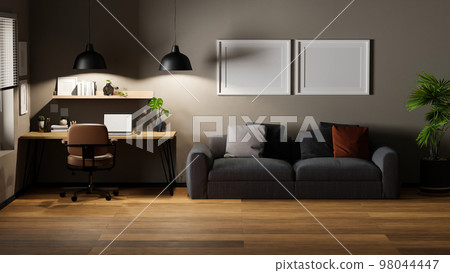 Contemporary and cozy living room with workstation, sofa, laptop, frame mockup on grey wall Contemporary and cozy living room with workstation, sofa, laptop, frame mockup on grey wall 98044447