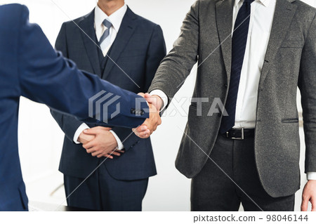 Businessman shaking hands Businessman shaking hands 98046144