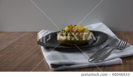 Delicious artichokes on black plate Delicious artichokes on black plate 98046833