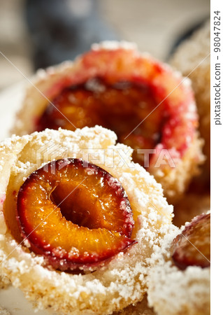 Plum dumplings Plum dumplings 98047824
