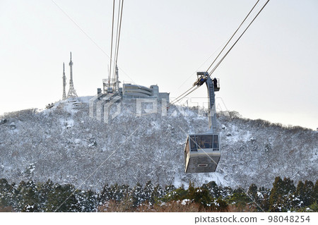 Shoot the landscape of snowy Mt. Hakodate and ropeway in Hakodate, Hokkaido in winter 98048254
