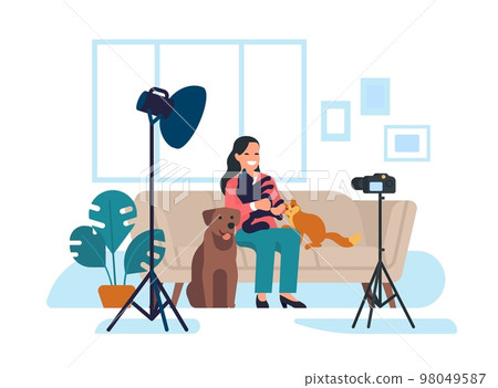 Veterinary blogger sits in front of camera with cats and dog. Woman records video blog about pets. Vlog streaming. Digital broadcast. Blogging for puppy or kitty owner. Vector concept 98049587