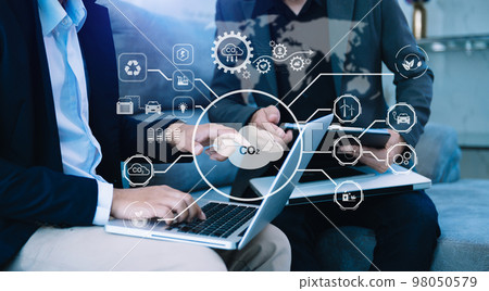 ESG concept of environmental, Green ethical business preserving resources, reducing CO2, Business person team working on laptop virtual smartphone to reduce CO2 ESG concept of environmental, Green ethical business preserving resources, reducing CO2, Business person team working on laptop virtual smartphone to reduce CO2 98050579