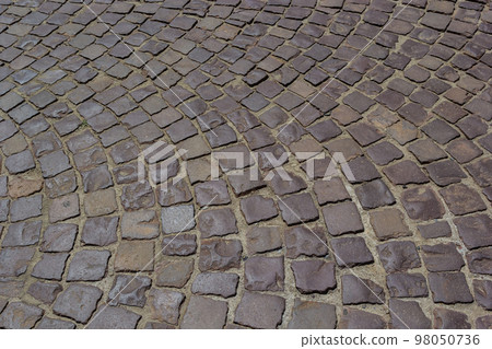 Cobblestone road. Gray cobblestone texture, vintage road surface 98050736