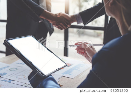Business shaking hands. Successful businessmen handshaking after good deal. Finishing up meeting concept Business shaking hands. Successful businessmen handshaking after good deal. Finishing up meeting concept 98051290