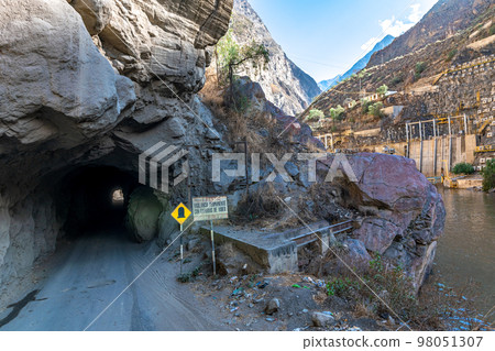 a road in the mountains carved in the rock a road in the mountains carved in the rock 98051307