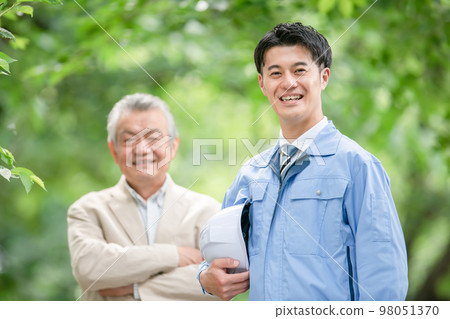 Men in work clothes and senior men Men in work clothes and senior men 98051370