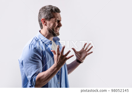 frustrated man with frustration isolated on grey background with copy space. frustrated man with frustration isolated on grey background with copy space. 98052145