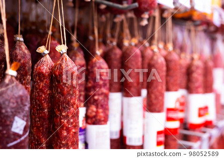 dried sausages on the counter 98052589