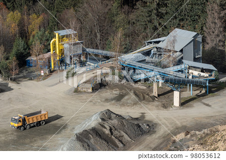 Truck and mining equipment in the quarry. Industrial stone quarrying. Truck and mining equipment in the quarry. Industrial stone quarrying. 98053612