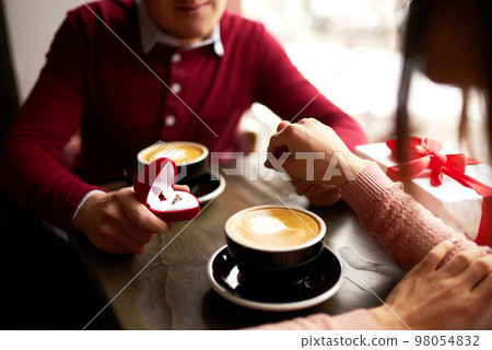 Valentine's Day concept. Happy couple in love with. Young loving couple celebrating Valentine's Day. Valentine's Day concept. Happy couple in love with. Young loving couple celebrating Valentine's Day. 98054832