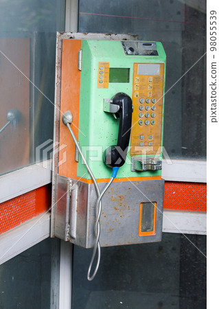 Old public phone is not in use. 98055539