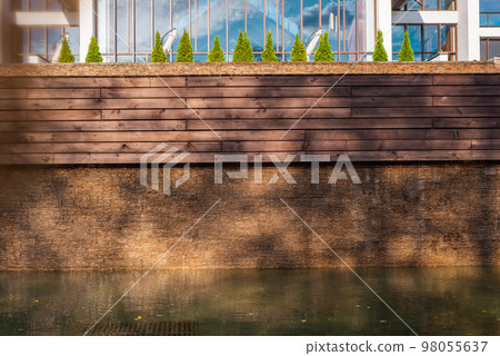wooden-stone wall above the fountain, water 98055637