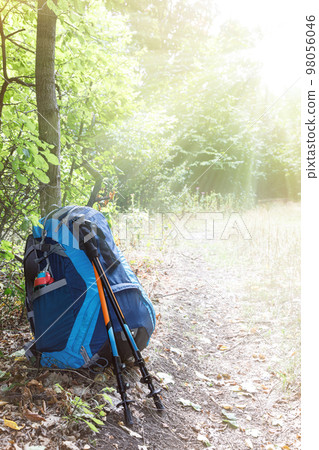 backpack and trekking poles backpack and trekking poles 98056046
