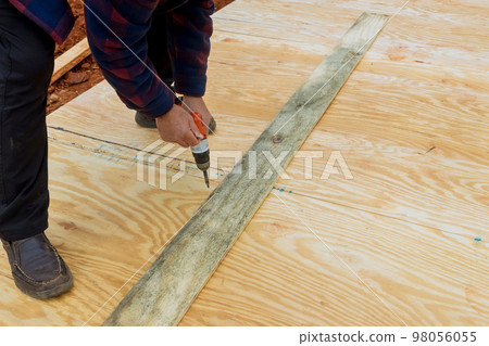 Wood framing beams stick framework of building shed deck foundation 98056055