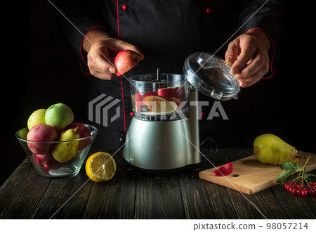 The chef adds a sliced apple to the blender for a sweet fruit drink. Healthy Vegetarian Breakfast or Dinner Idea The chef adds a sliced apple to the blender for a sweet fruit drink. Healthy Vegetarian Breakfast or Dinner Idea 98057214