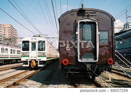107 series 100 series and old passenger cars parked at the depot 107 series 100 series and old passenger cars parked at the depot 98057299