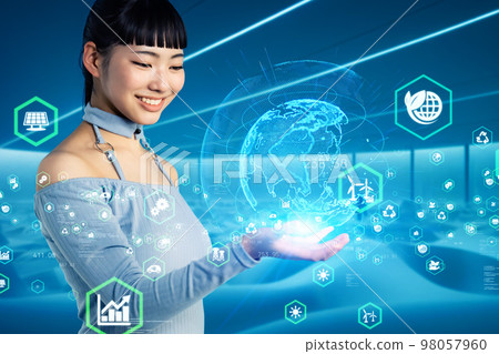 A woman looking at images of the earth Future environment image SDGs A woman looking at images of the earth Future environment image SDGs 98057960