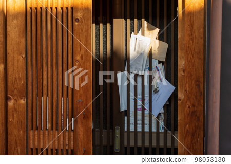 Letters piled up in an empty house Letters piled up in an empty house 98058180