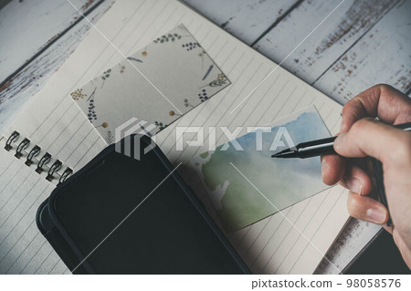 notebook, pen, card and smartphone notebook, pen, card and smartphone 98058576