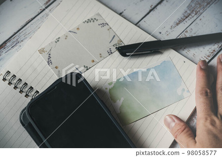 notebook, pen, card and smartphone notebook, pen, card and smartphone 98058577