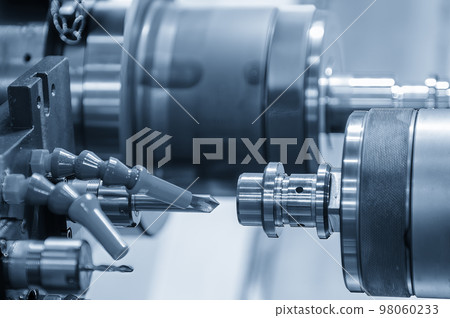 The multi-tasking CNC lathe machine chamfer cutting the metal shaft parts by milling turret. The multi-tasking CNC lathe machine chamfer cutting the metal shaft parts by milling turret. 98060233