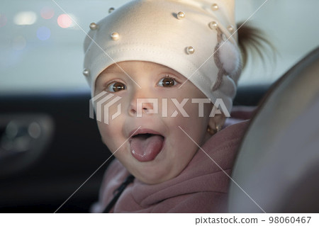 Little girl shows her tongue. Funny kids. Little girl shows her tongue. Funny kids. 98060467