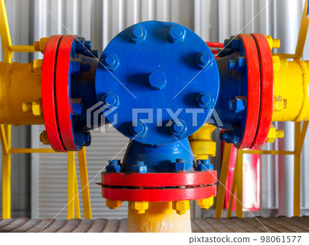 Close-up view of metal pipe connections. Industrial painting of metal parts. Wear-resistant all 98061577