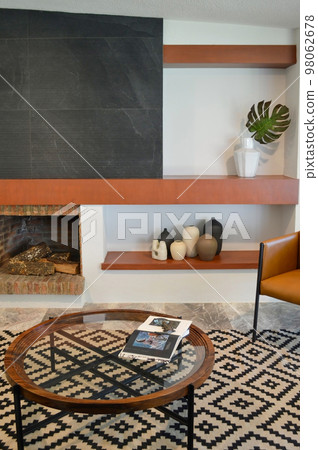 Double table in brown wood, with circular metal edges and several glass shelves. Double table in brown wood, with circular metal edges and several glass shelves. 98062678