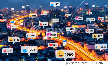 Social media icons fly over city downtown showing people reciprocity connection Social media icons fly over city downtown showing people reciprocity connection 98062879
