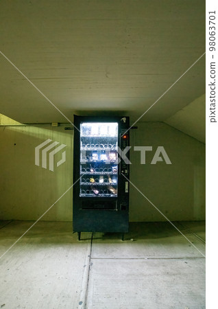 vending machine, with interior light, wall, ceiling and concrete floor vending machine, with interior light, wall, ceiling and concrete floor 98063701