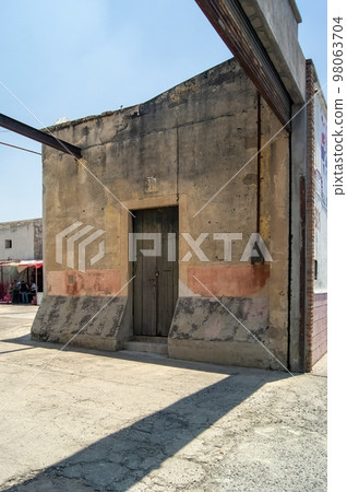 abandoned building beams, wooden door, wooden door, concrete apartente, beams protruding, mexico abandoned building beams, wooden door, wooden door, concrete apartente, beams protruding, mexico 98063704