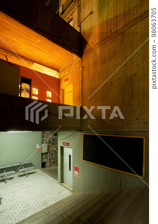 orange light that contrasts with the concrete modern concrete architecture cement building brutalist , stairs of an institution or school, orange light that contrasts with the concrete modern concrete architecture cement building brutalist , stairs of an institution or school, 98063705