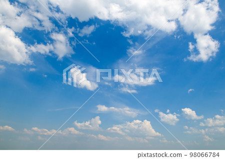 Blue sky and cumulus clouds. 98066784