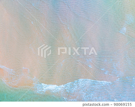 Top view of amazing pastel sand beach and turquoise sea copy space available nature background, High angle view sea sand background 98069155