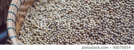 White pepper in a basket on the market BANNER, long format 98070054