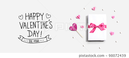 Valentines Day message with a gift box and hearts Valentines Day message with a gift box and hearts 98072439