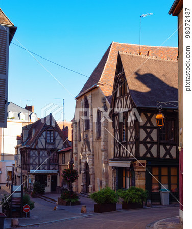Montlucon old town with medieval fachwerk houses 98072487