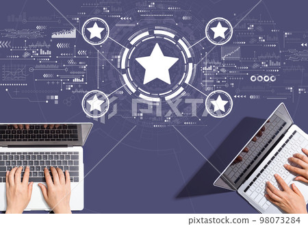 Rating star concept with people working together 98073284