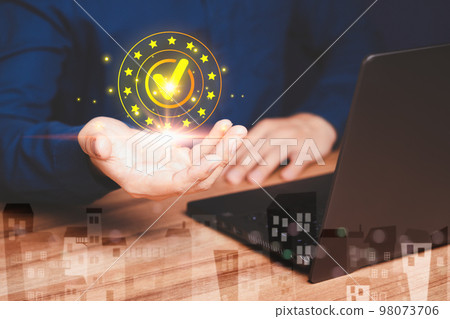 Businessman working with sign of the top service quality assurance on virtual screen. Guarantee, Standards, ISO certification and standardization concept. 98073706