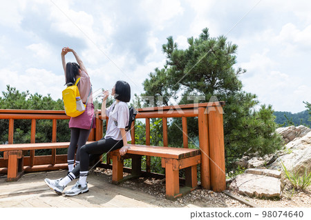 korean young women hiking and plogging_looking at scenery korean young women hiking and plogging_looking at scenery 98074640