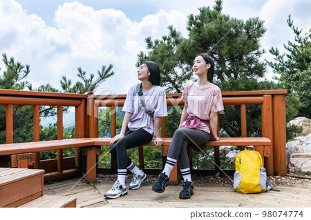 korean young women hiking and plogging_looking at scenery korean young women hiking and plogging_looking at scenery 98074774