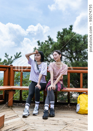 korean young women hiking and plogging_looking at scenery korean young women hiking and plogging_looking at scenery 98074795