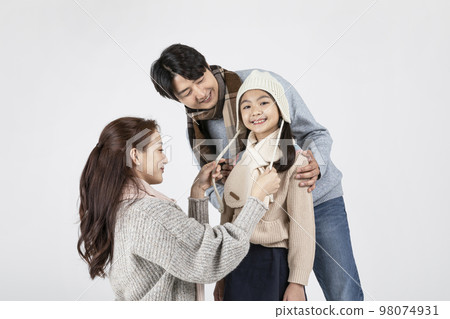 happy Asian Korean family, isolated in white background__in winter fashion, wearing muffler 98074931