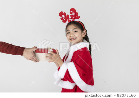 happy Asian Korean family in Christmas concept_giving, receiving gifts 98075160